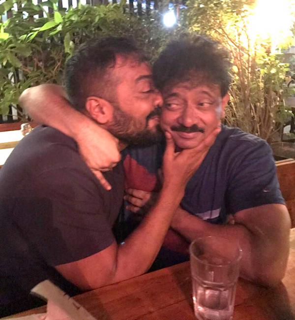  WTF! Ram Gopal Varma and Anurag Kashyap go on a KISSING SPREE in a public place 