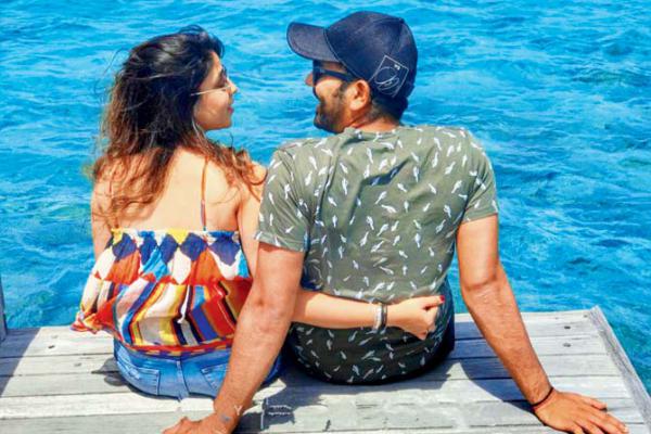 Rohit Sharma and wife Ritika Sajdeh can't seem to take their eyes off each other
