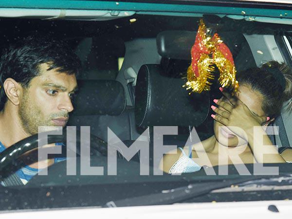 Omg Why is Bipasha Basu hiding her face in these latest pictures with hubby Karan Singh Grover? 
