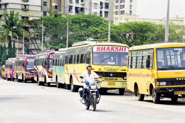 School bus staffers protest not being allowed to enter school premises