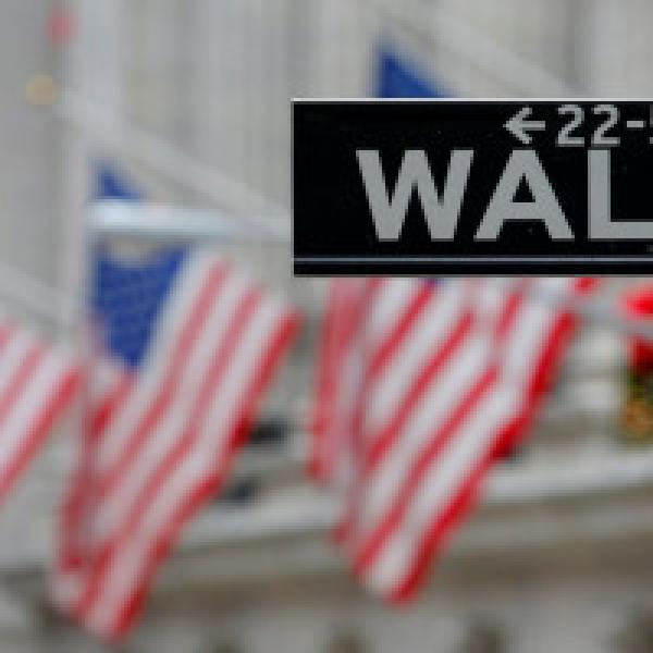 Wall Street ends higher, dollar down after Fed minutes