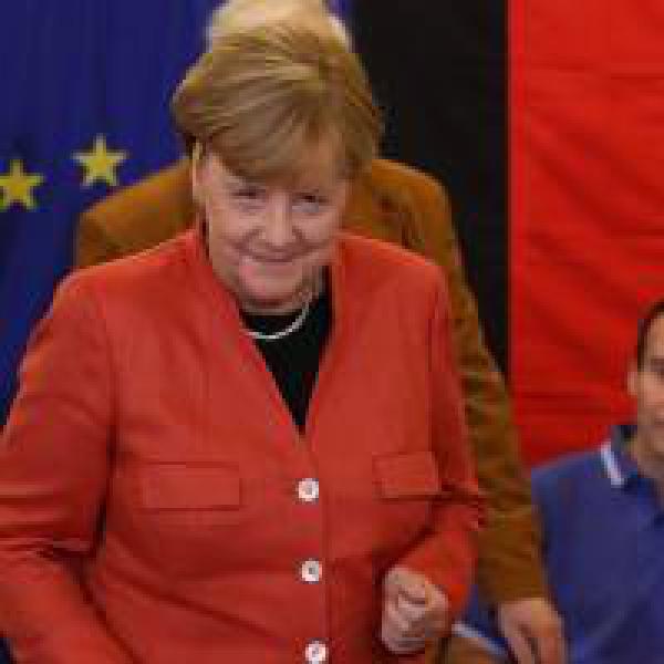 Angela Merkel sends positive signal to Theresa May on Brexit talks