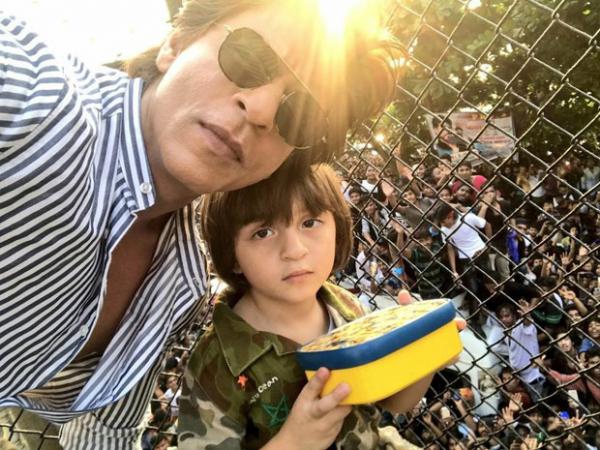  Check out: Shah Rukh Khan poses with little Abram and a massive crowd on his 52nd birthday 