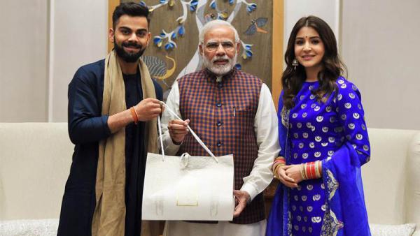 Breaking: Anushka and Virat&apos;s First Reception Photos Are Here & We Are Shook