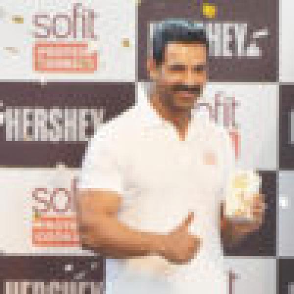 John Abraham Swears By This ‘Better For You’ Snack And Now, We Do Too!