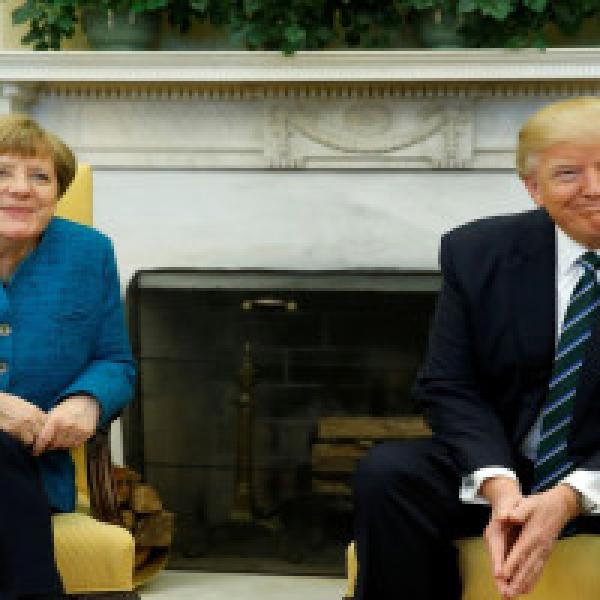 Donald Trump praises Germany#39;s Merkel for #39;fantastic#39; G20 despite protests