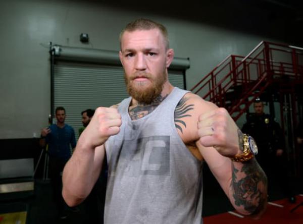 Conor McGregor BLASTS Floyd Mayweather: Pay Your Taxes, Old Man!