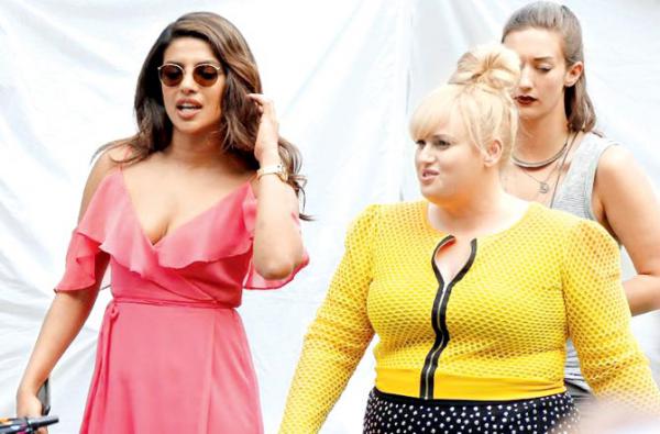 Priyanka Chopra shows off ample cleavage in this pink dress