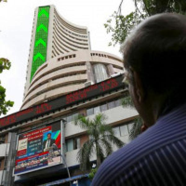 RIL, Infosys, banks help Nifty close above 9900 for 1st time; ITC limits Sensex gains
