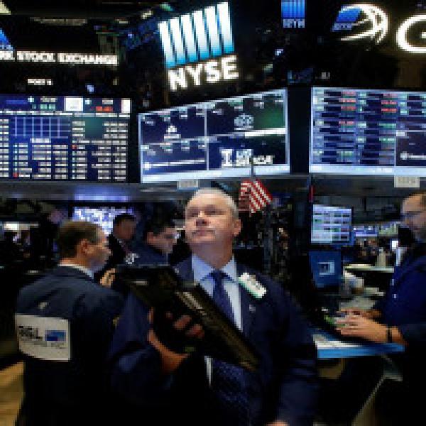 Wall Street dips as GE, energy shares weigh