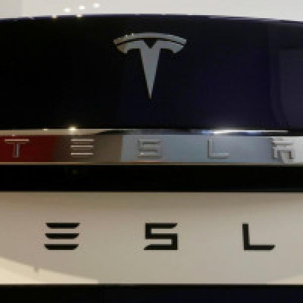 Model 3 demand, higher revenue propel Tesla shares higher