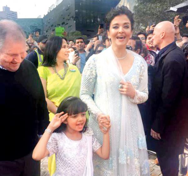 Aishwarya Rai Bachchan and daughter Aaradhya twin in white