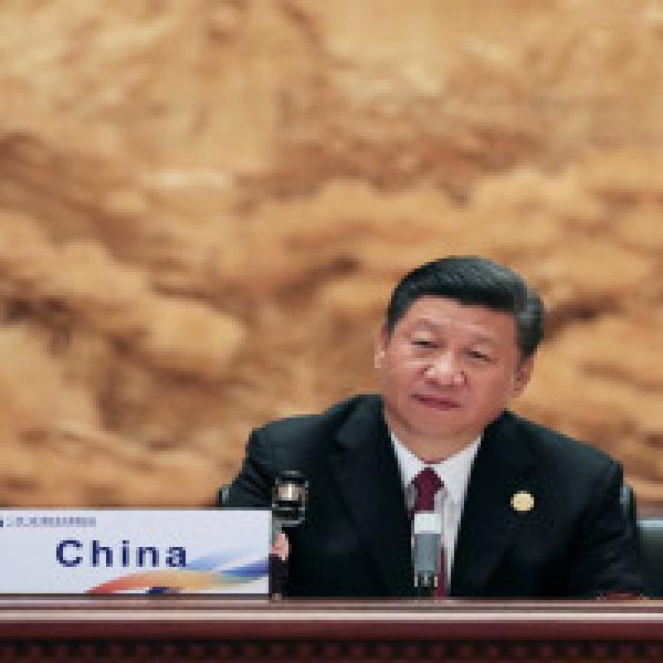 China#39;s Xi Jinping says global economy improving, urges resistance to protectionism