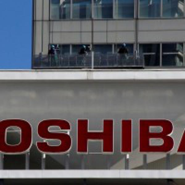 Toshiba shares gain after Western Digital offers to exit chip bid for better JV terms