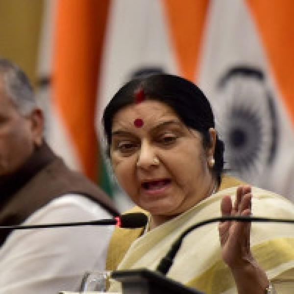Swaraj holds trilateral talks with US, Japan counterparts