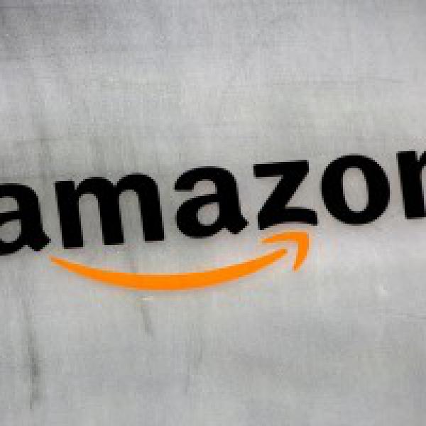 Shoppers Stop partners Amazon India