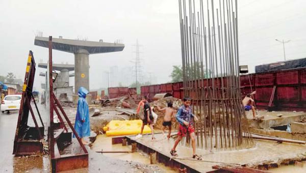 Mumbai rains: MMRDA caught napping as kids dive into Metro 'dead' pool