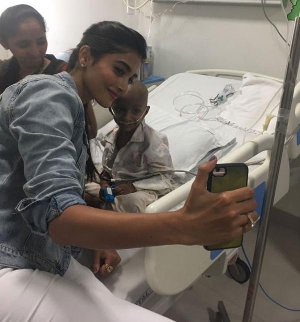 Pooja Hegde meets cancer-affected children, brings smiles on their faces