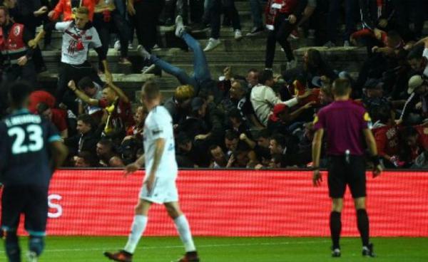 French Football Stadium Barrier Collapses In After-Goal Excitement Injuring 29