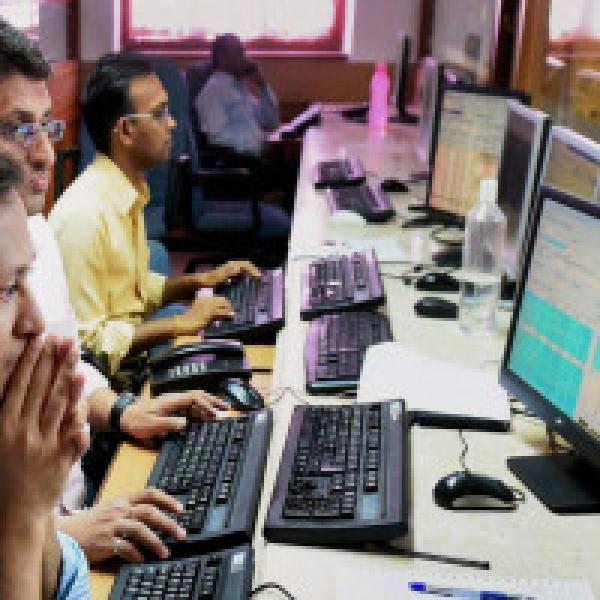 Nifty fails to hold 10K, Sensex ends volatile session mildly higher; realty shines