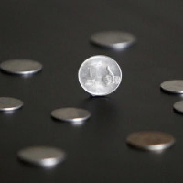 Rupee holds up, climbs 4 paise to 65.10 against dollar
