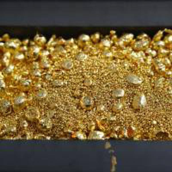 Gold spurts on festive cheer, global cues