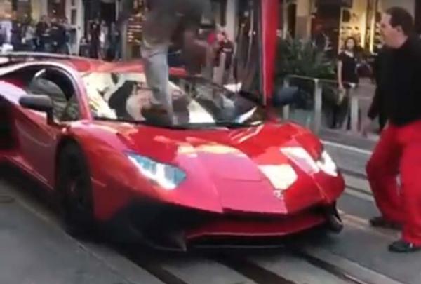 Some Guy Leapt On Top Of A Rs. 5 Crore Lamborghini Aventador & Gets Knocked Out By The Owner