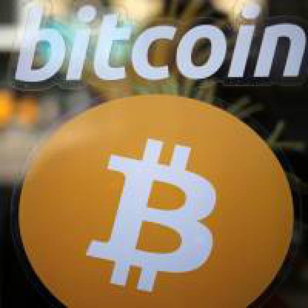 Bitcoin is a #39;speculative bubble#39; and unlikely to become a real currency, says UBS