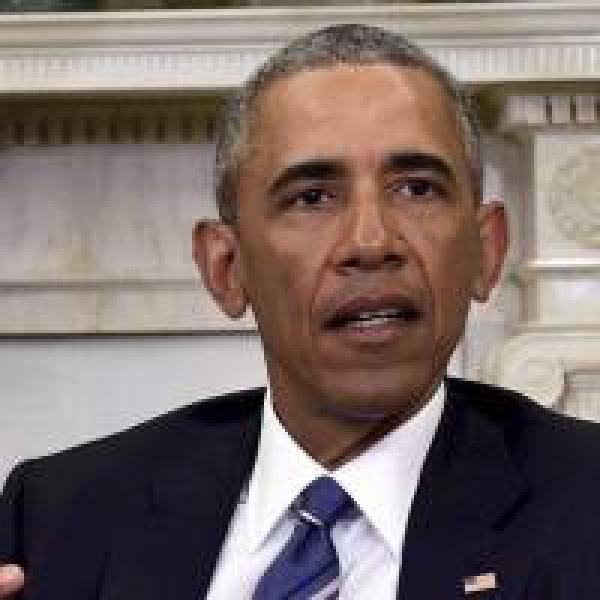 Barack Obama blasts #39;politics of division#39; on return to campaign trail