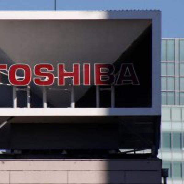 Toshiba sees annual loss of almost $1 billion after tax related to chip unit sale