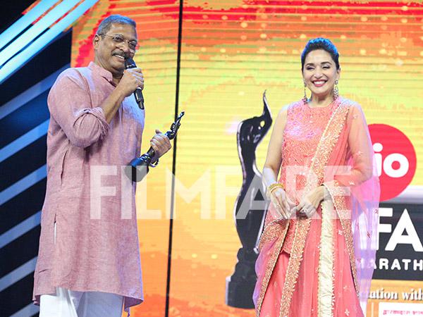 Madhuri Dixit Nene presents Nana Patekar his Best Actor award at the Jio Filmfare Awards (Marathi) 
