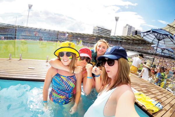 Ashes: Young Australian women cool off in the pool during Gabba Test