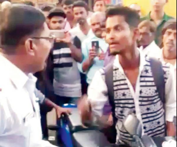 Mumbai traffic cop abused and assaulted by two men for towing bike