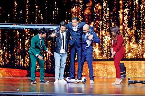 Mithun Chakraborthy tries to dance on hoverboard