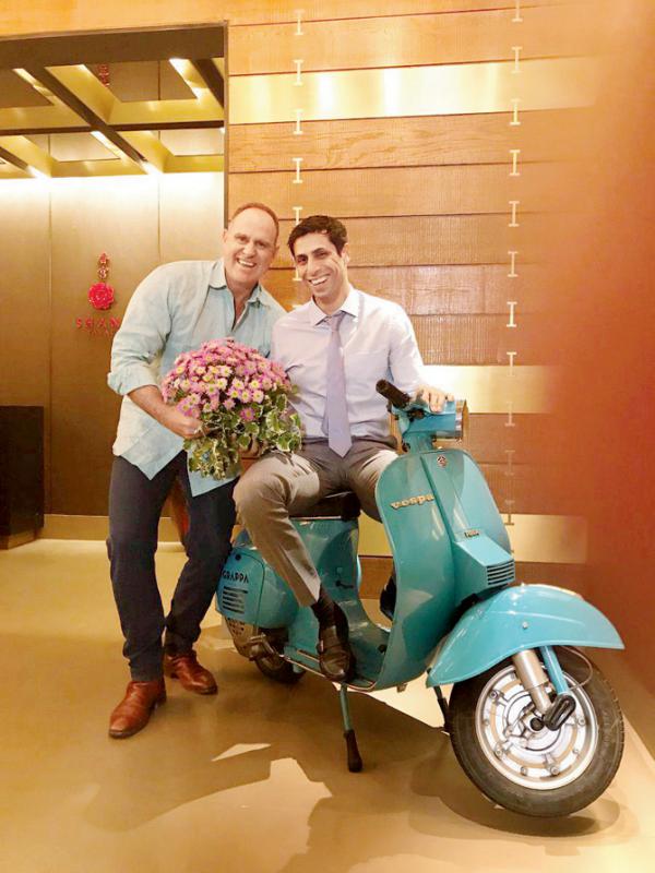Ashish Nehra and Matthew Hayden are all smiles on a scooter