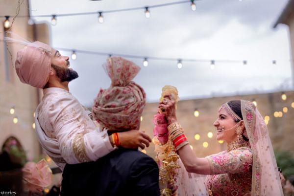  FIRST PHOTOS: Anushka Sharma and Virat Kohli look royal in their traditional outfits in the first photos from their wedding in Italy! 