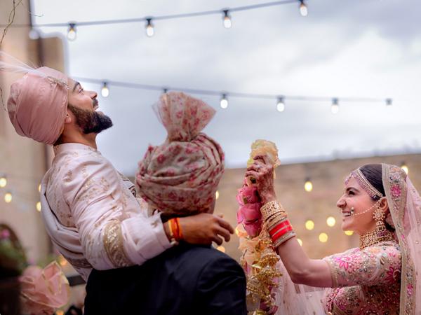 All the details you need about Anushka Sharma and Virat Kohlis wedding outfits honeymoon and more 
