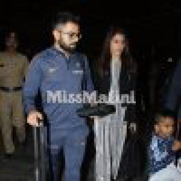 IN PHOTOS: Virat Kohli & Anushka Sharma Leave For South Africa With The Indian Cricket Team