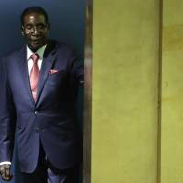 Former Zimbabwe ministers loyal to Mugabe charged with corruption