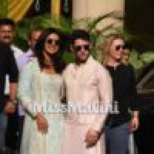Priyanka Chopra & Nick Jonas Look Perfect In Pastels For Their Puja Ceremony