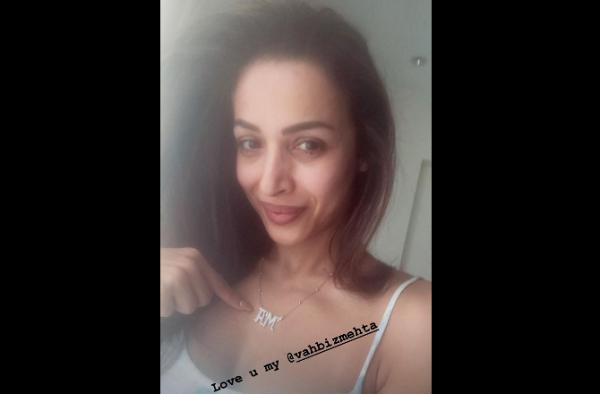 Is Malaika Arora making it official by flaunting this 'AM' pendant?