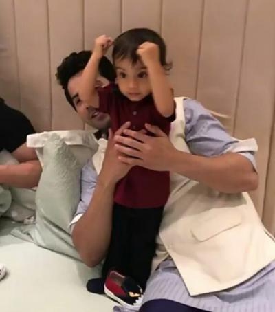  WATCH Varun Dhawan plays with Salman Khan's little nephew Ahil Sharma at Eid party 